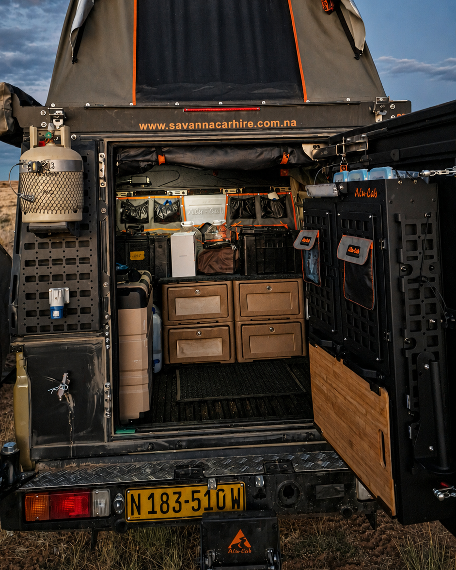 Camping drawers and kitchen equipment inside a 4x4