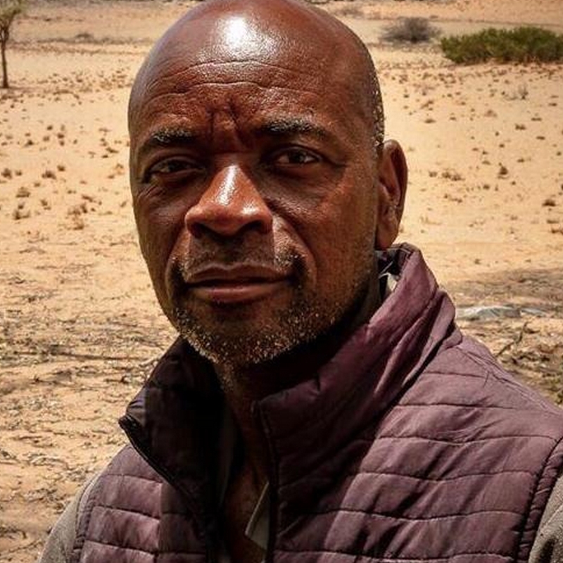Portrait of Hendrick Munembome in arid north-west Namibia.