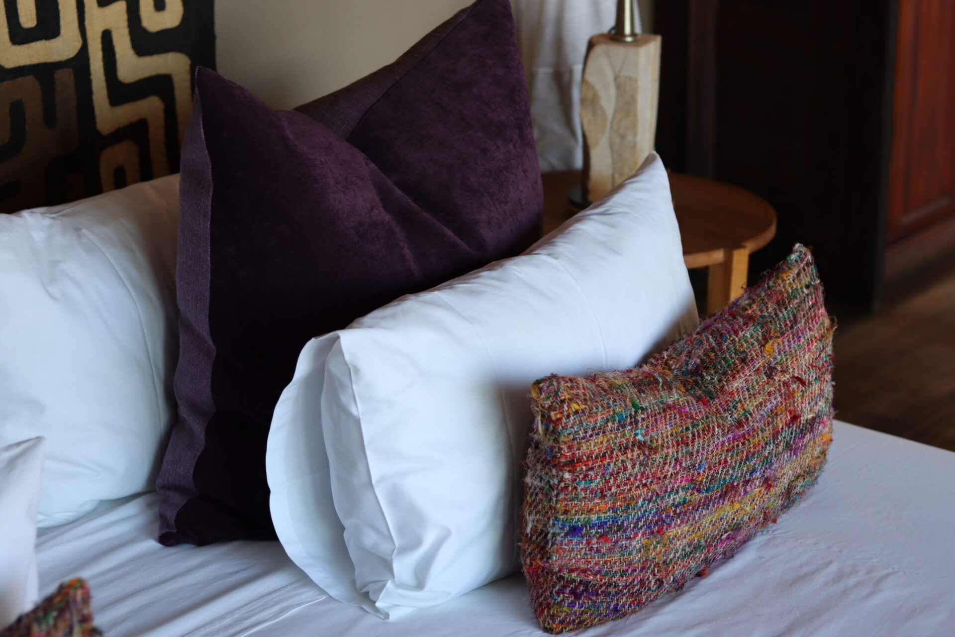 Lodge guest-room pillows, textiles and bedside detail