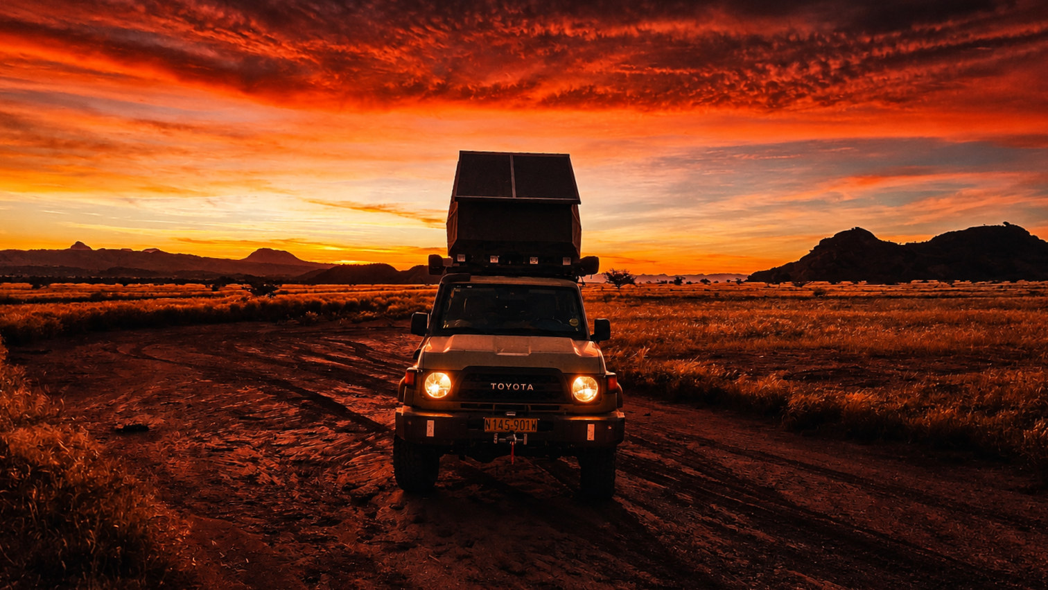 Camping under a Namibian sunset · WHYNAMIBIA library; journey inspiration, not the arrival accommodation.